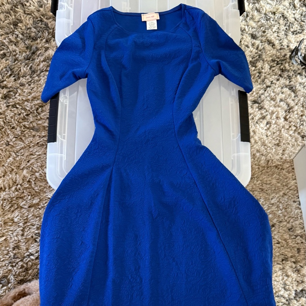Never been worn, royal blue dress, size XS, pull on, short sleeve.